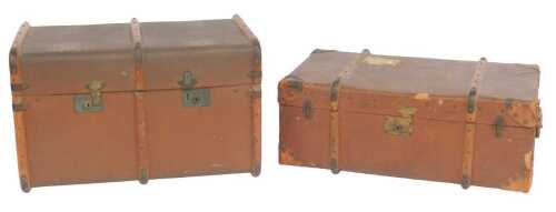 A canvas and metal bound trunk, with two locks, 75cm wide, and another similar with leather...