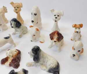 A group of Sylvac pottery dog figures, to include a Spaniel wall plaque, 9cm high, various... - 2