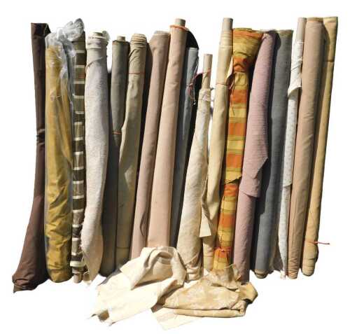 Various bolts of upholstery fabric, different colours and designs, to include beige, pale grey,...