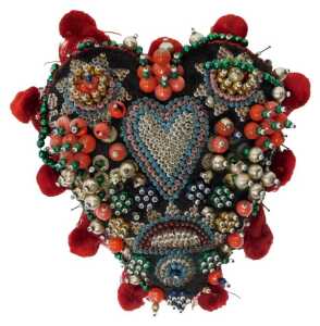 A World War I sweetheart beadwork pin cushion, of heart form, bearing the phrase Success to Our...