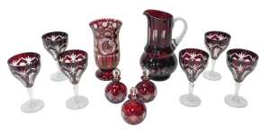 A group of Bohemian ruby flashed glass, comprising six wine glasses, 16cm high, together with a...