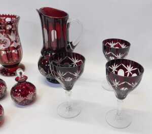 A group of Bohemian ruby flashed glass, comprising six wine glasses, 16cm high, together with a... - 2