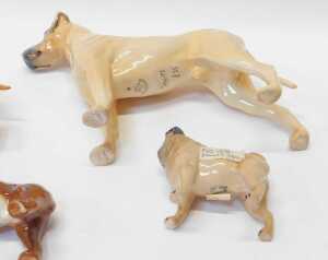 A group of Beswick pottery dog figures, to include CH Ruler of Ouborough, 17cm high, a Pug,... - 2