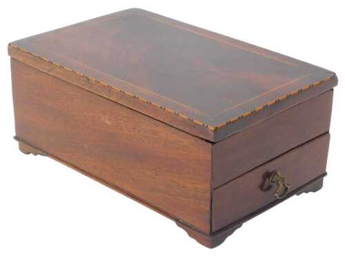 A late Georgian mahogany and line inlaid jewellery box, the hinged lid enclosing a velvet...