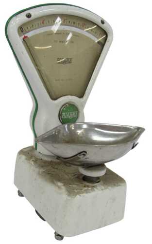A set of Avery scales, with a fan-shaped dial, to weigh 1lb, with a metal tray, 62cm high.