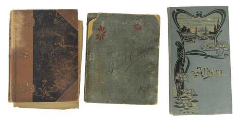 Three albums of early 20thC postcards, to include real photo, some London foil enhanced,...