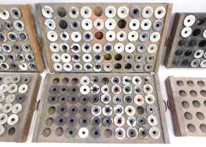 Six stained pine printer's drawers, containing some ceramic inkwells, each 29cm wide. - 3