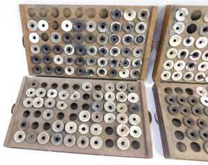 Six stained pine printer's drawers, containing some ceramic inkwells, each 29cm wide. - 4