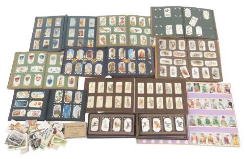 Cigarette cards, to include Wills Arms of Companies, Players Wrestling and Jiu Jitsu, etc. (1...