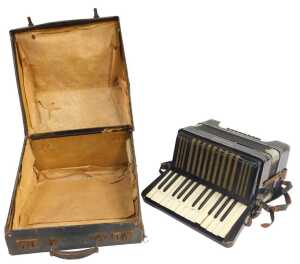 A Hohner Student III piano accordion, with twenty-seven buttons, in black, with a carrying case. - 2