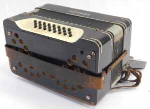 A Hohner Student III piano accordion, with twenty-seven buttons, in black, with a carrying case. - 4