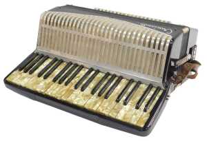 A Crucianelli Italia piano accordion, with one hundred and twenty buttons, in black, with...