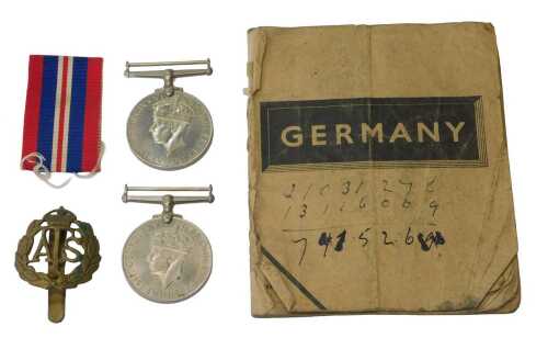 Two Second World War 1939-45 Campaign medals, in a Germany book on German culture, history and...