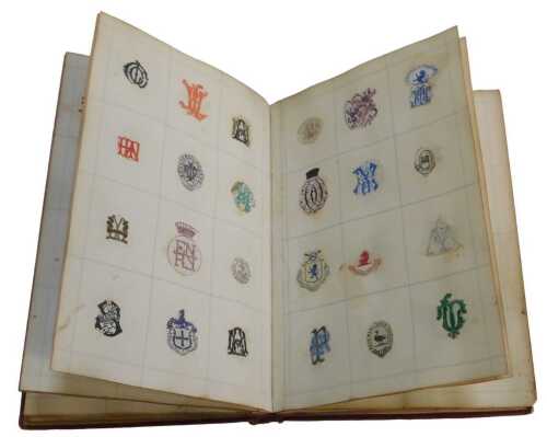 A Victorian album of crests, put together by an Annie Mary Jugham. From the collection of Derek...