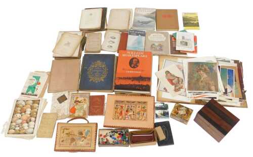 Books and ephemera, to include bookplates, Russian tapestry booklets and a table map, a map copy...
