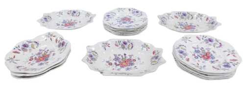 An early 19thC Spode pottery New Fayence part dessert service, decorated with pink, purple and...