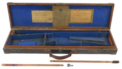 An early 19thC mahogany and leather-bound gun case, the blue felt fitted interior bearing...