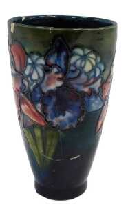 A Moorcroft pottery Orchid Green pattern vase, of cylindrical tapering form, impressed marks,...