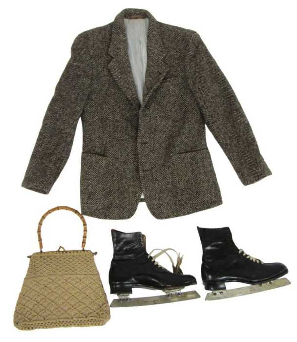 A pair of black leather ice skates, with John Wilson blades, together with a McNutt tweed blazer,...