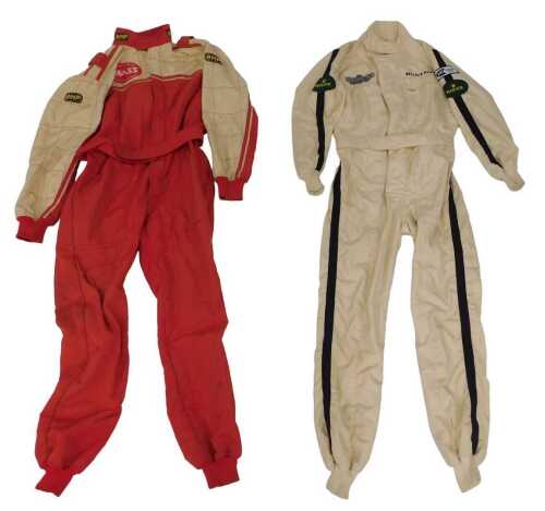 An OMP racing suit and a Jays racing suit, with various applied patches including Dunlop, Rolex...