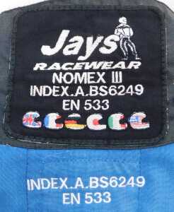 A Jays Nomex 3 racing suit, and a pair of Blue Castle overalls. (2) - 2