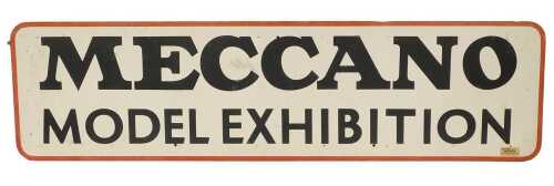 A Meccano Model Exhibition plywood sign, on a white background with red surround, 61cm x 230cm.