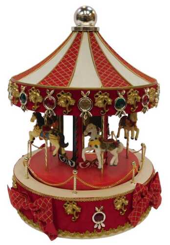 A Mr Christmas holiday carousel, with lights and sound.
