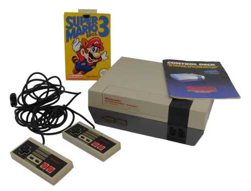 A Nintendo Entertainment System, power cable, and Super Mario Brothers 3.