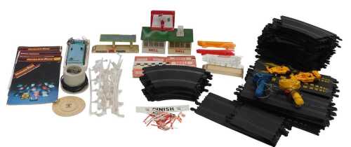 Scalextric track and accessories, including straights, curves, controllers, crash barriers, pit...