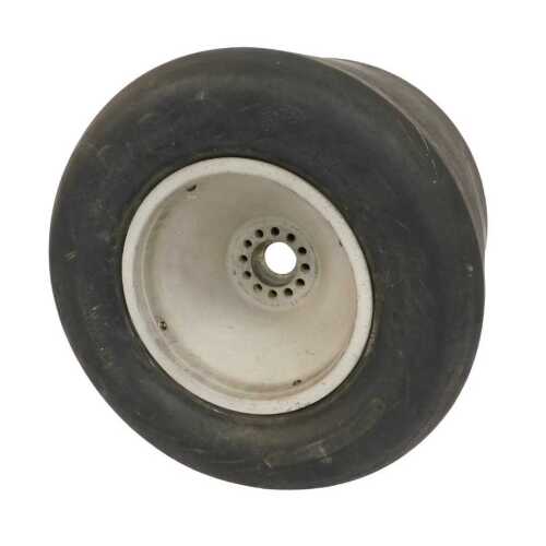 A 1970's BRM racing car Goodyear tyre and centre, approx 1ft 9" wide, 1ft 11" circumference.