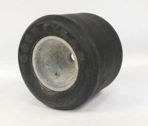 A 1970's BRM racing car Goodyear tyre and centre, approx 1ft 9" wide, 1ft 11" circumference. - 2