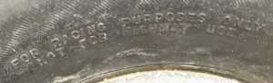 A 1970's BRM racing car Goodyear tyre and centre, approx 1ft 9" wide, 1ft 11" circumference. - 4
