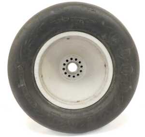 A 1970's BRM racing car Goodyear tyre and centre, approx 1ft 9" wide, 1ft 11" circumference. - 6