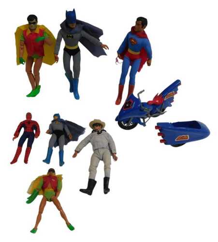 Various action figures, including Superman, Batman, Robin, Lone Ranger, Batman Bat Cycle and...
