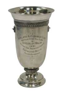 Raymond Mays interest. A George V silver trophy vase, of inverted bell shape, with a reeded...