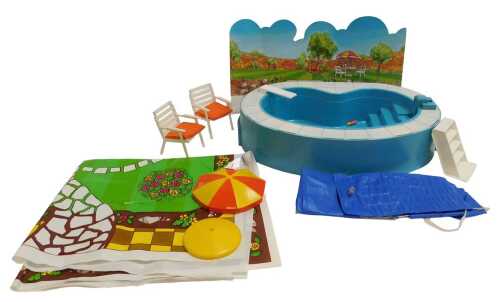 A Pedigree Sindy swimming pool, floor mat, and outdoor accessories including chairs and parasol....