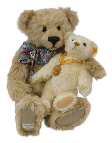 A Steiff Margerete Bear Millenium Edition, blonde mohair with medallion, 32cm tall, No. 654701,...