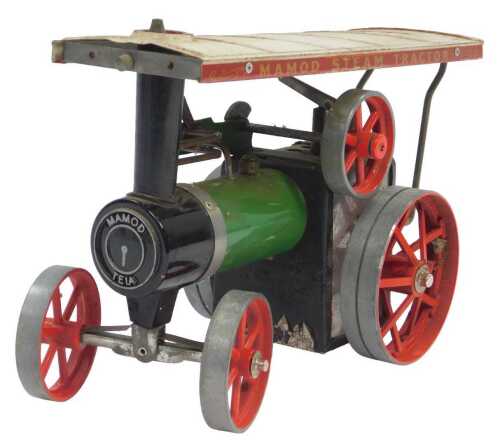 A Mamod steam tractor, to front TE1A, green, black, red and cream livery, 25cm long.