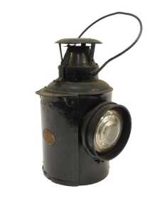 A London Midland and Scotland Railway bullseye carriage lamp, black with clear lens.
