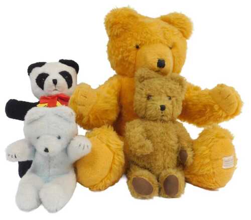 A Wendy Boston plush bear, 55cm high, and three smaller Wendy Boston bears. (4)