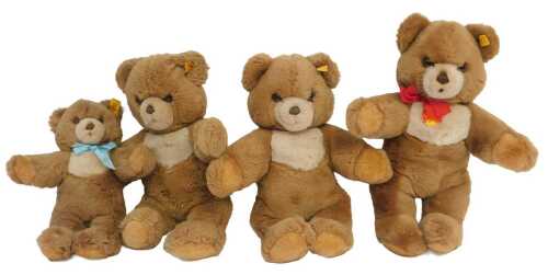 A small Steiff Orsi Teddy bear, with blue ribbon, cloth tag and button to ear, 26cm high, and...