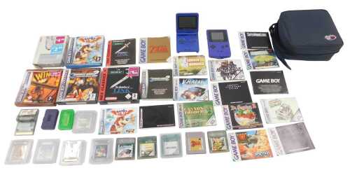 A Nintendo Gameboy Advance SP, a two player link cable, and various games including Banjo Pilot,...