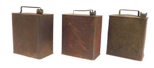 Three petrol cans, including Shell Motor Spirit, Shell Mex, and Regent Motor Spirit.