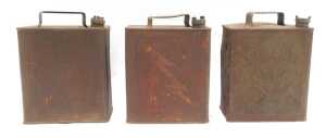 Three petrol cans, including Shell Motor Spirit, Shell Mex, and Regent Motor Spirit. - 2