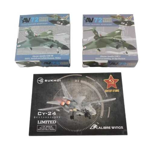 A Sukhoi Calibre Wings Russian diecast aeroplane, 1:72 scale, and two AV72 Premium Range diecast...