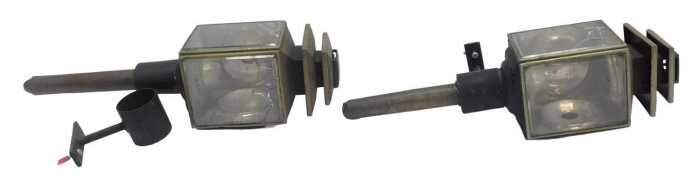 A pair of brass carriage lamps.