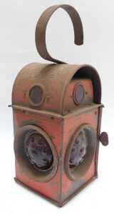 A Kenyons Serilight lens railway lamp, and a buddy lamp with red lens. (2) - 2