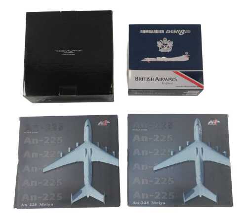Two AF1 Models AN225 Mrya diecast jets, a British Airways Bombardier-8 Series 300 jet, and a...