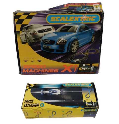 A Scalextric Speed Machines Audi TT slot car racing set, and a track extension, both boxed.