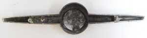 A Morris hood badge, three petrol caps, and a Daimler near side cap. (5) - 7